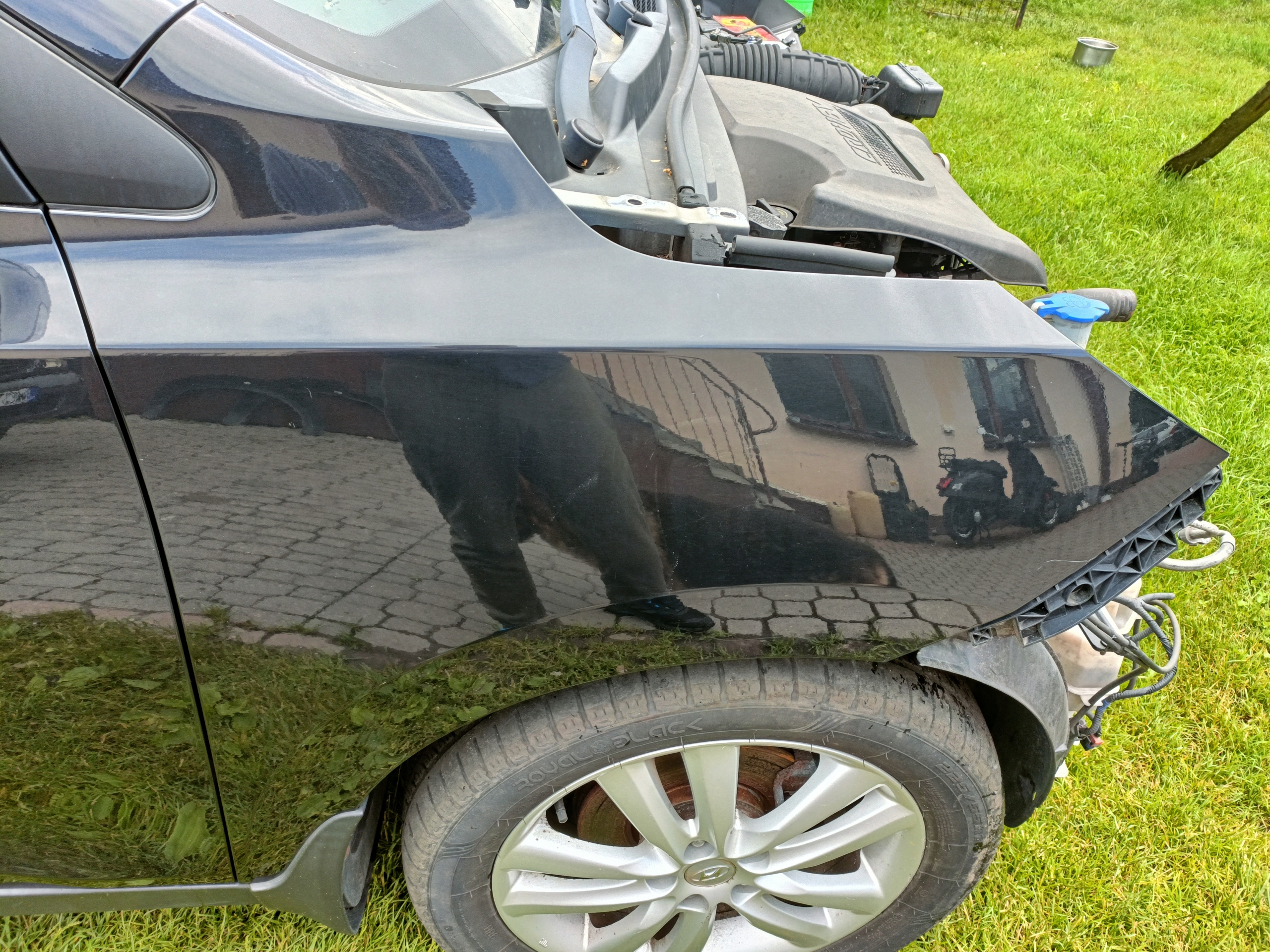 ŁADNY BŁOTNIK PRAWY HYUNDAI IX35 KOLOR 1K