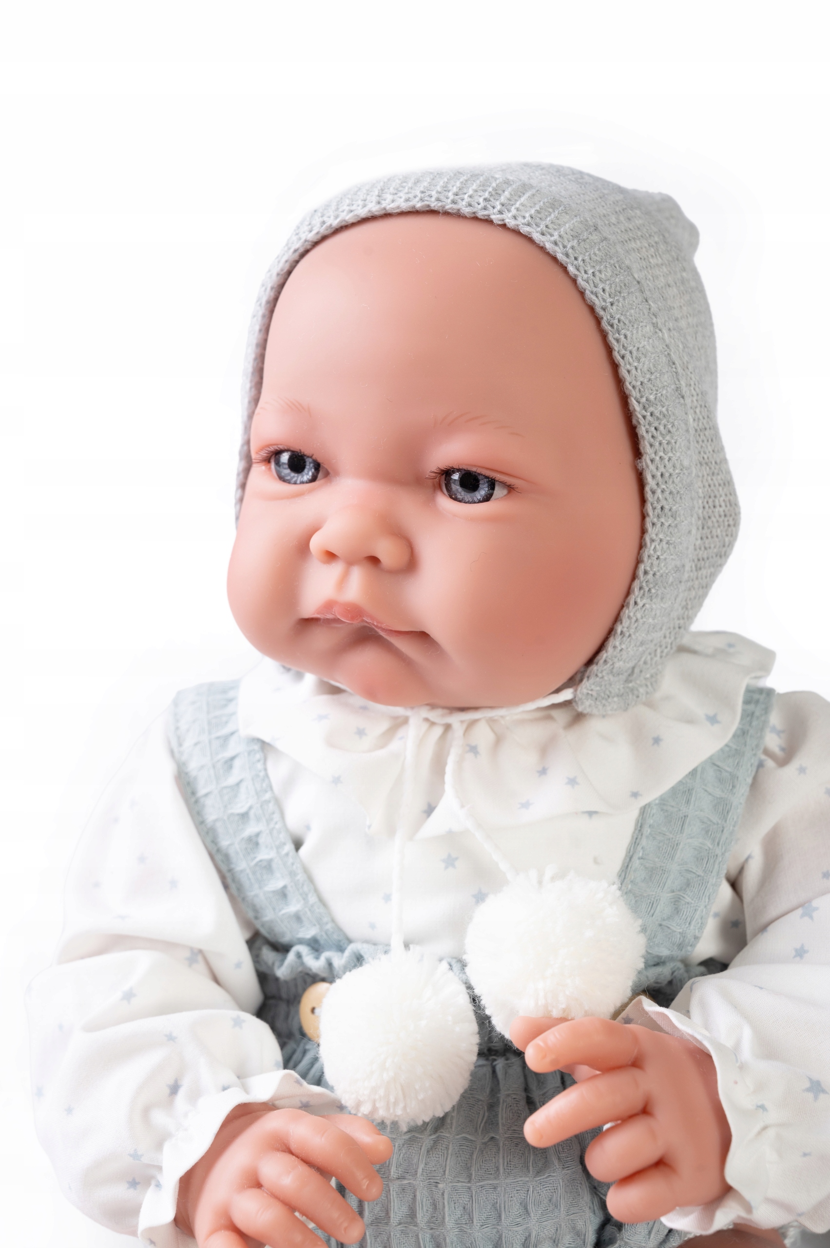 Lalka Antonio Juan Nico con cojín 33231 42 cm