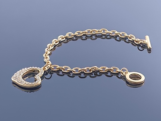 

Złota bransoletka Charms