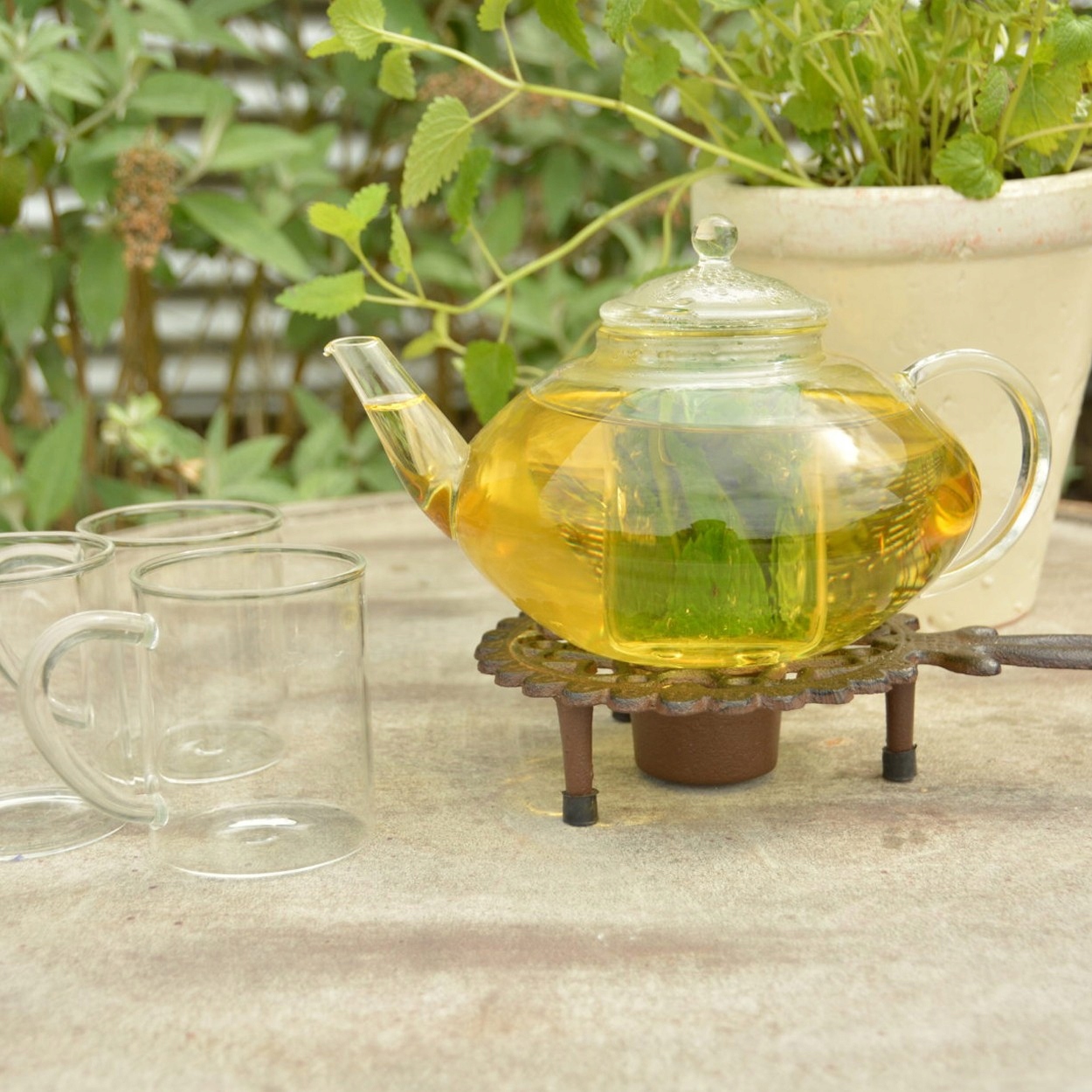 Podgrzewacz żeliwny z uchwytem POD CZAJNIK DZBANEK z herbatą z rączką RETRO EAN (GTIN) 8714982103407