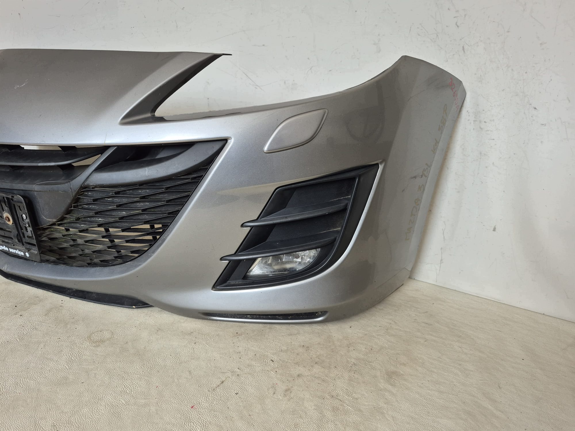 MAZDA 3 BL 08- bumper front front SPR LAK.38P BCW8-50031