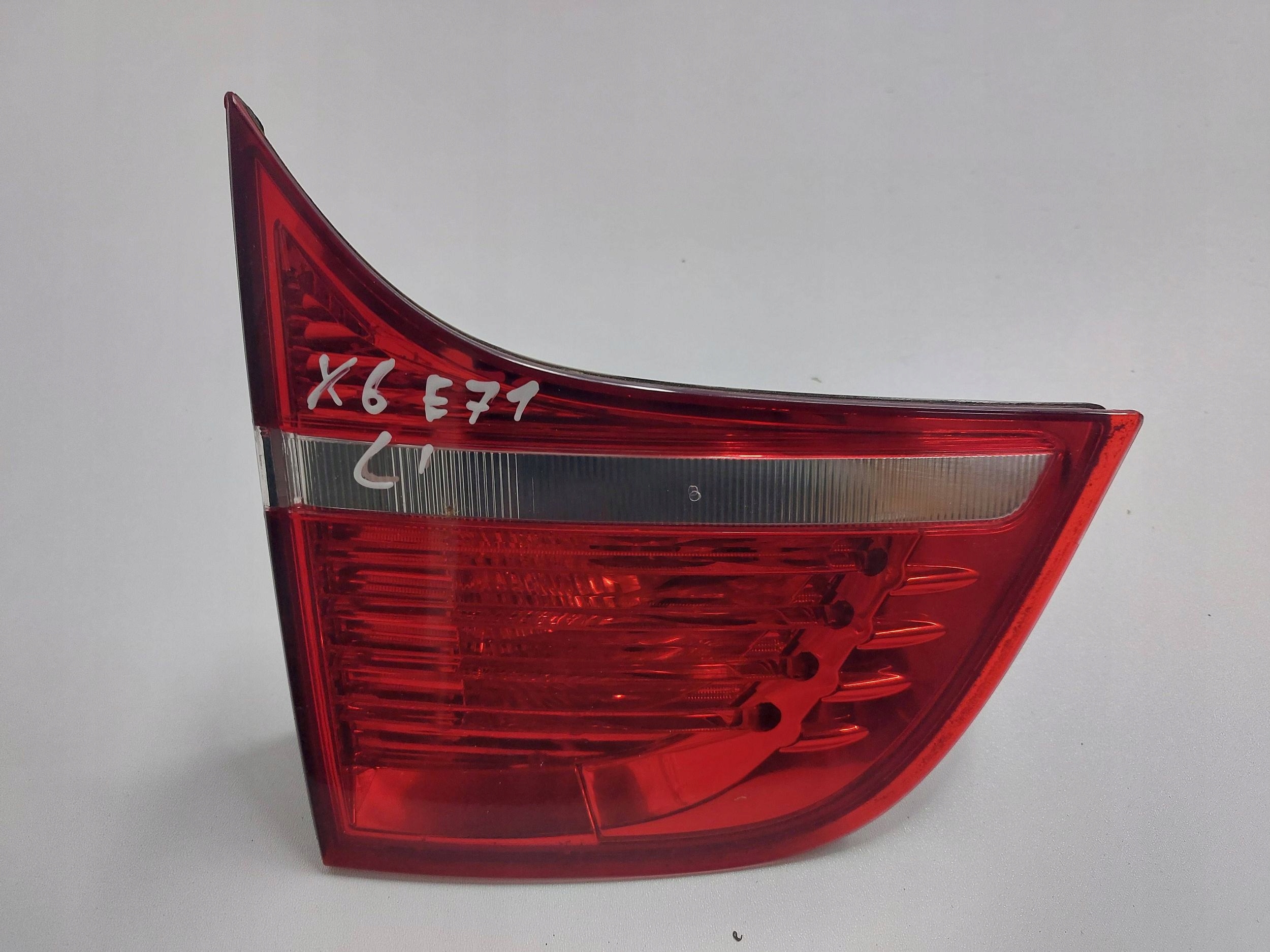 BMW E71 X6 07r> light rear part left to the bonnet