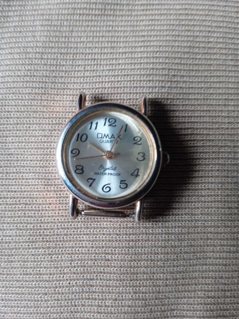 Damski zegarek OMAX Quartz Crystal Waterproof. Koźminek Licytacja