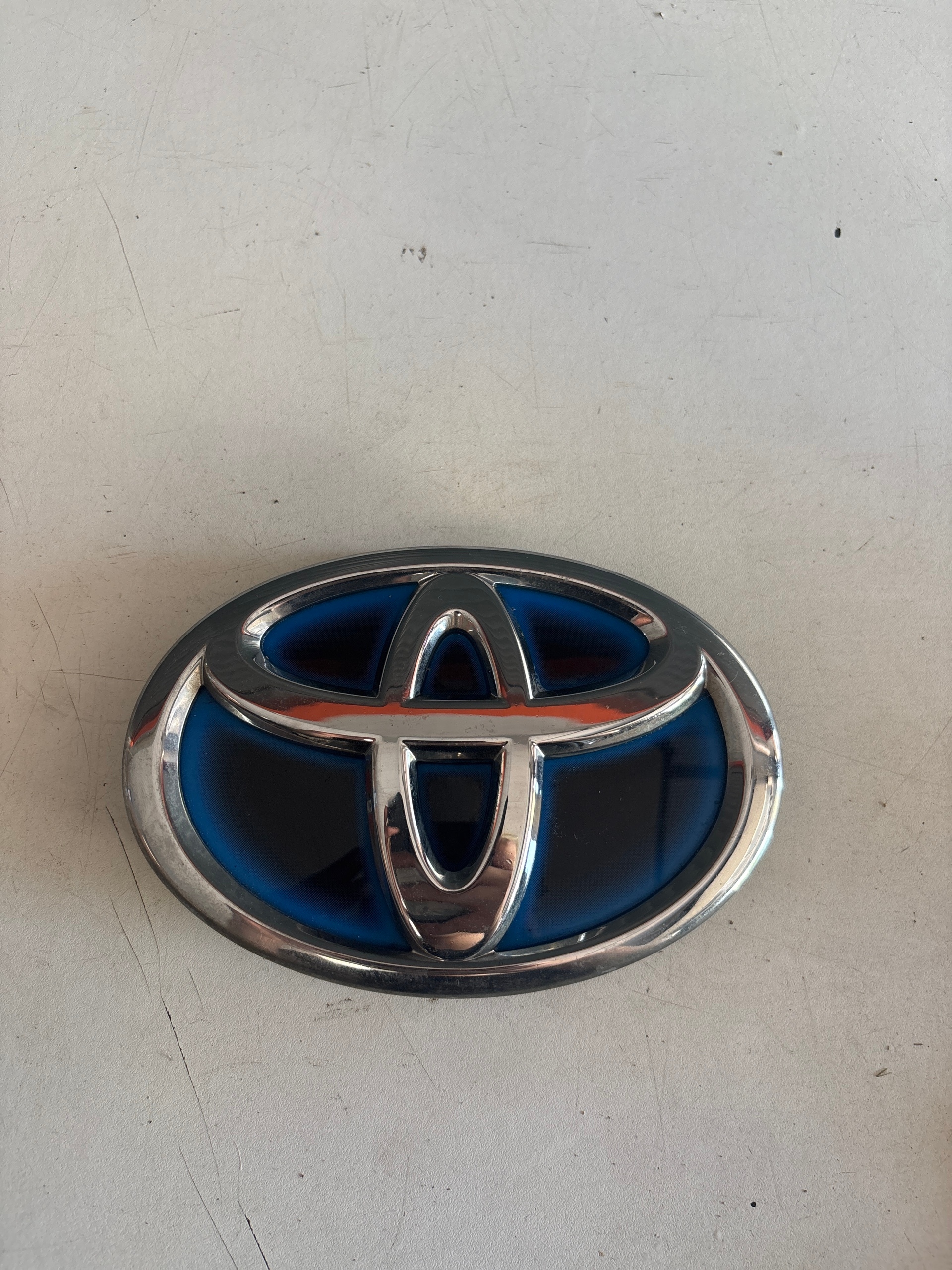 TOYOTA ЕМБЛЕМА ЗНАЧОК ПЕРІД 75312-12360 