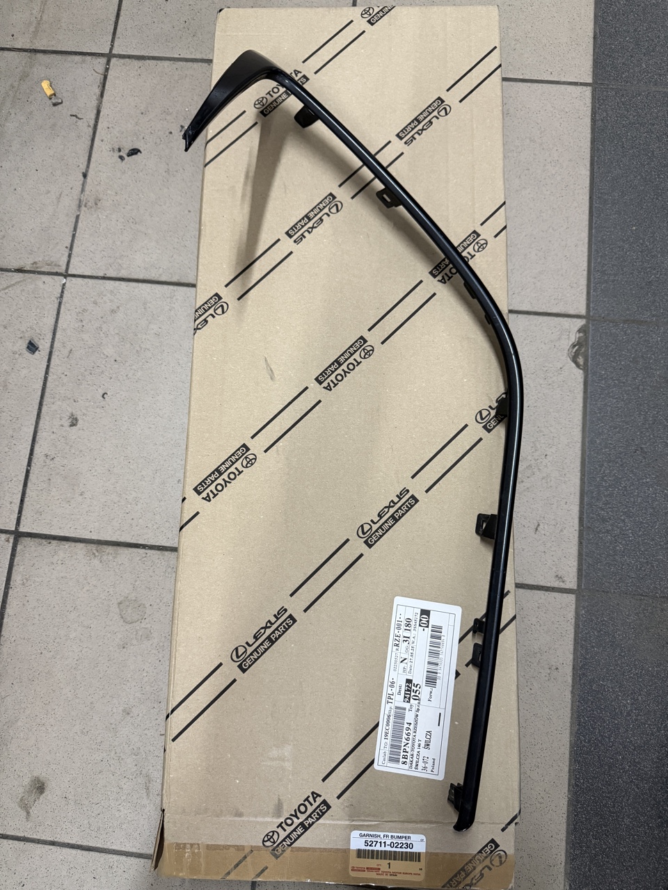 ПРАВА НАКЛАДКА БАМПЕРА COROLLA E21 52711-02230 