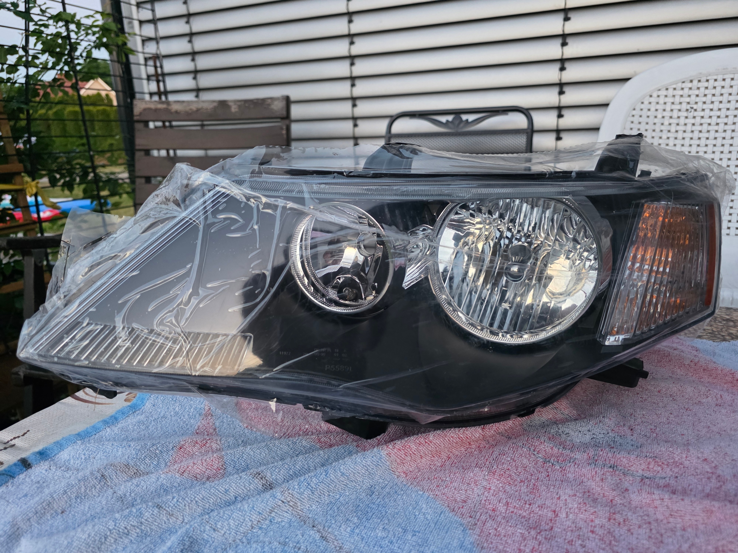 ФАРА MITSUBISHI OUTLANDER II 2007-NOWA ЛІВА ФАРА ПЕРЕДНЯ 8301A705 