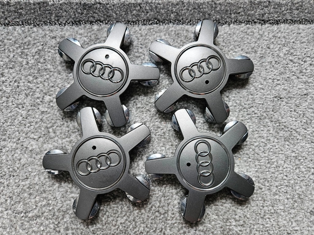 КОЛПАЧКИ ЗАГЛУШКИ ЗВЕЗДЫ ПАУКИ 8X0 OEM AUDI A1 A2 5X100 8X0601165 КОМПЛЕКТ EU 