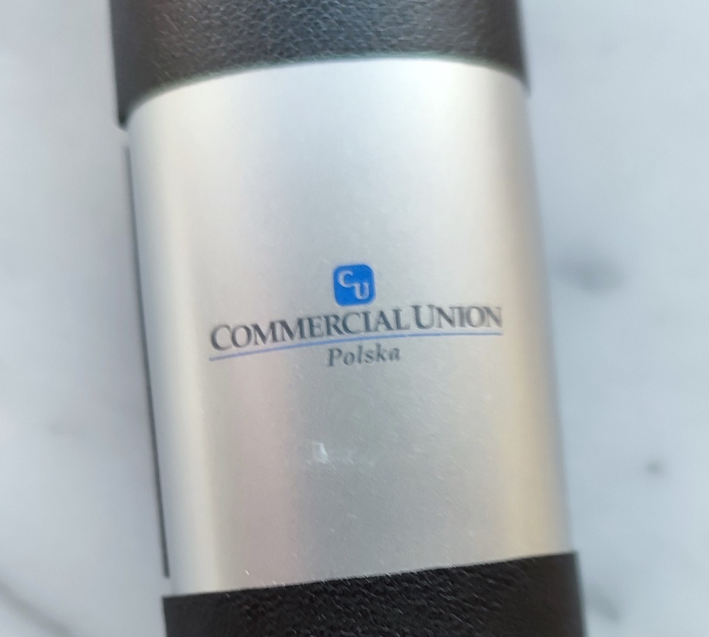 gadżet reklamowy kalkulator z logo CU + długopis Konin Licytacja