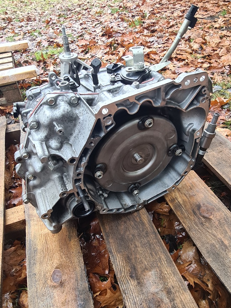 SKRZNIA ПЕРЕДАЧ АВТОМАТ NISSAN J11 1.2 X421A 