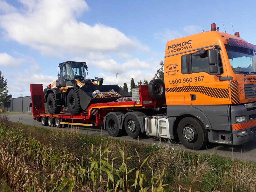 Laweta transport wózków widłowych koparek Poznań