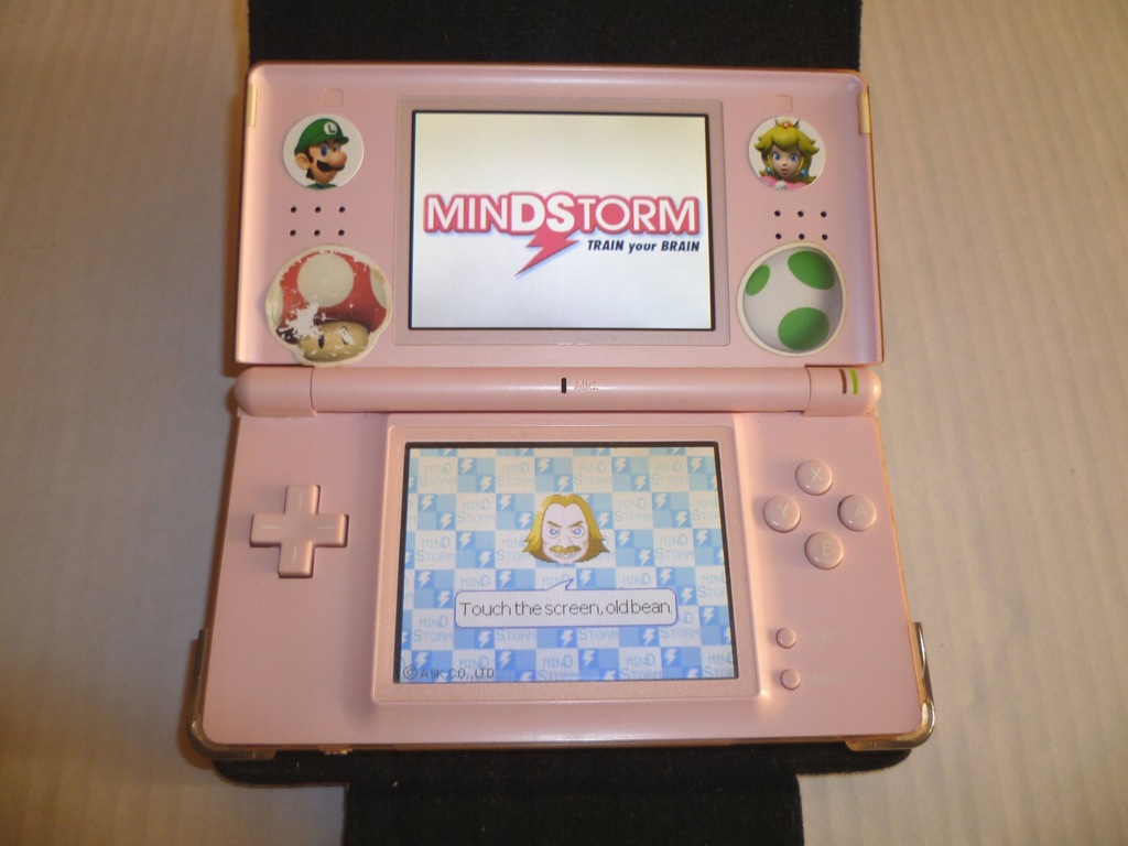 Konsola Nintendo DS różowa + 5 gier + etui