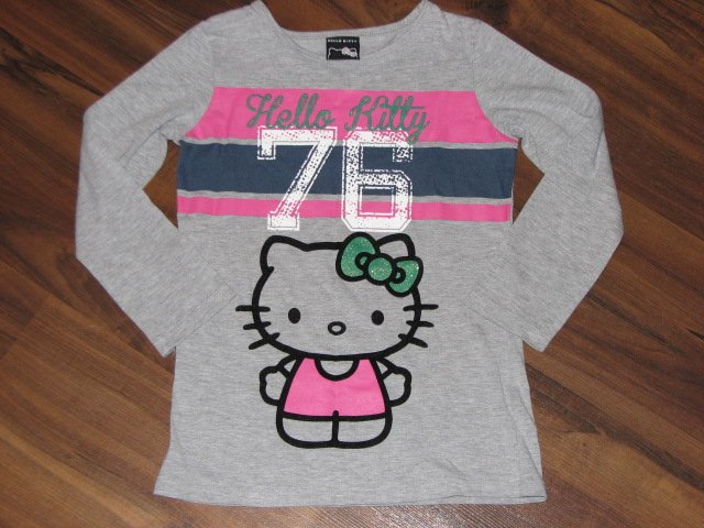 *GEORGE* Hello Kitty fajna bluzka brokat 116 122