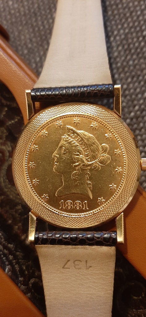 Corum złoty zegarek
