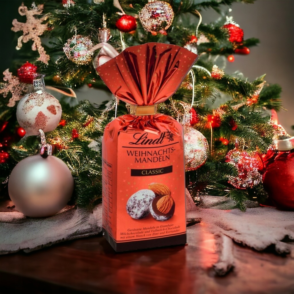 LINDT świąteczne migdały w czekoladzie 100 g DE