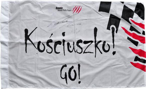 Flaga teamowa z autografem Michała Kościuszki