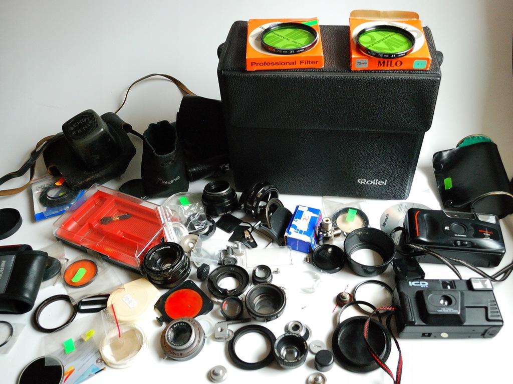 Duży zestaw fotograficznych gadżetów ponad 50 szt. obiektywy filtry aparaty