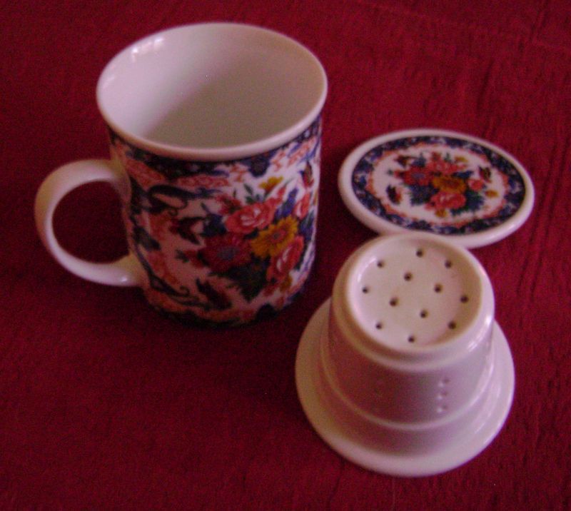 kubek porcelana z zaparzaczem + herbata smakowa