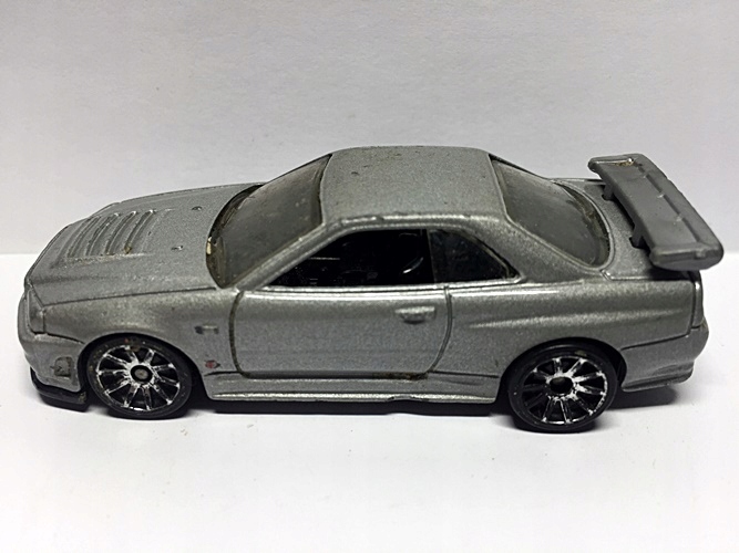 ミニカー Hot Wheels NISSAN SKYLINE GT-R (R34) Hot Wheels Premium Nissan Skyline GT-R (BNR34) Pojazd 1:43