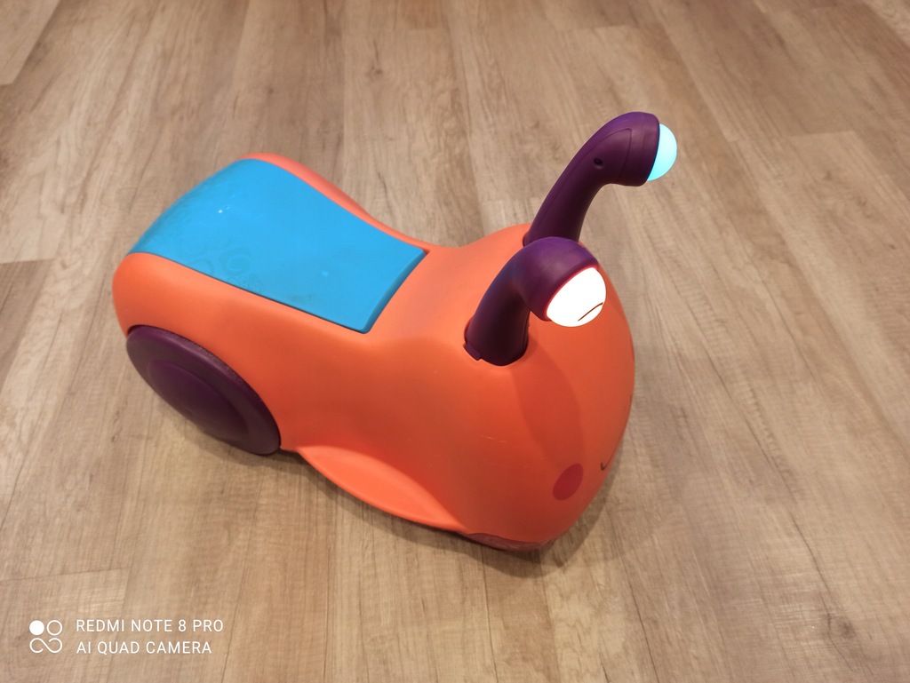 Jeździk B. Toys Buggly Wuggly pomarańczowy