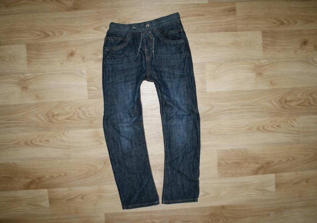 Modne spodnie JEANSY szeroka GUMA 134