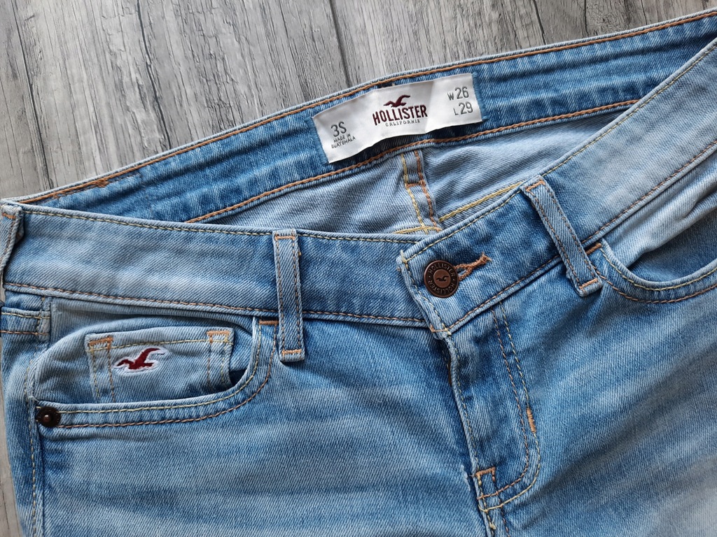HOLLISTER jeans niebieskie logo W26 L29