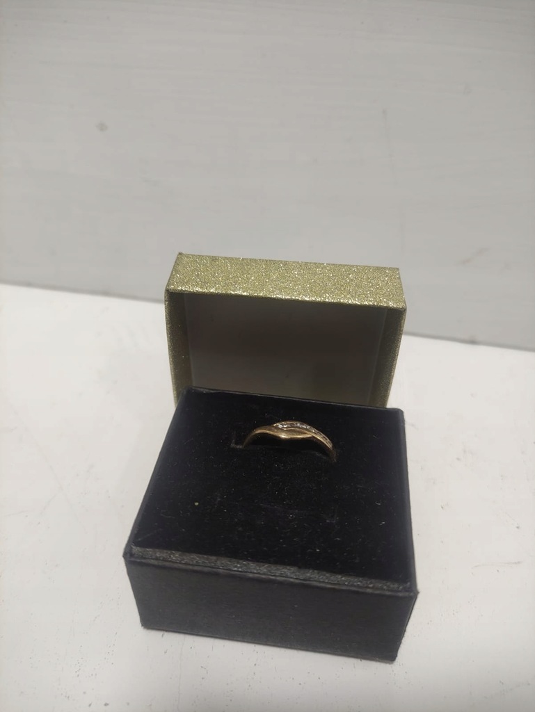 Złoty pierścionek z cyrkoniami PR: 585 (999/24)