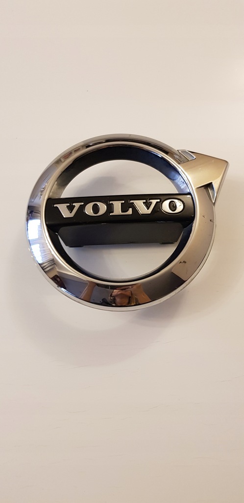 Emblemat Volvo XC60 II w grilla 31425815 ORYG