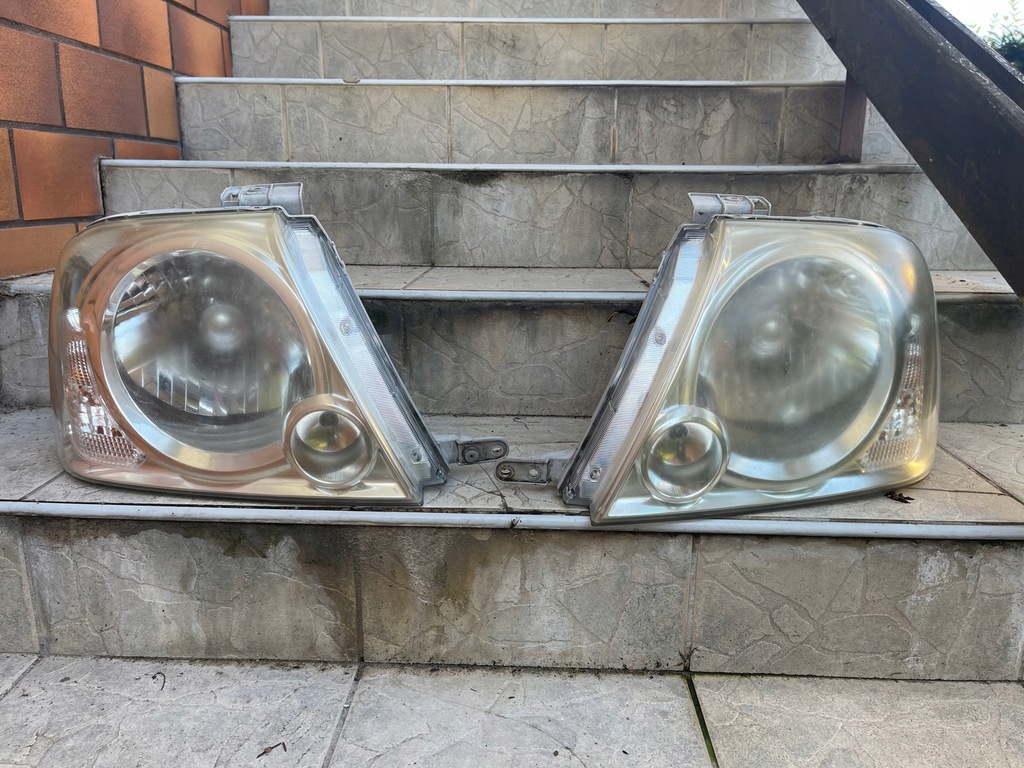 Suzuki Grand Vitara XL lampa przednia Europa oryg - 11206043850 ...