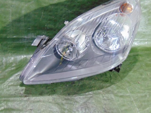 LAMPA LEWA PRZEDNIA PRZÓD OPEL ZAFIRA B 7606993659