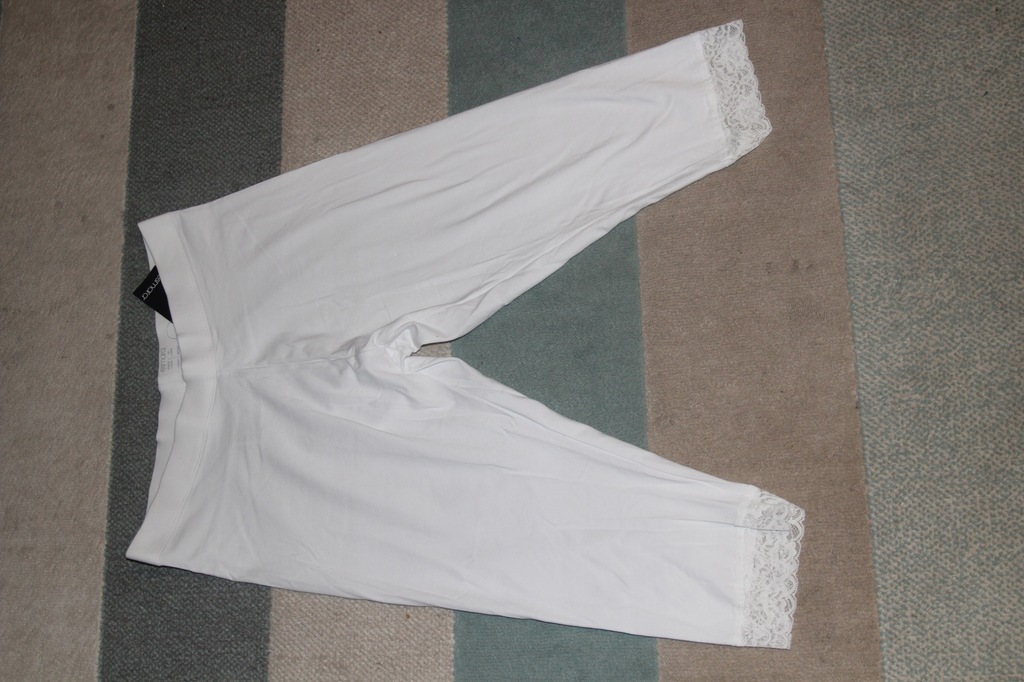 spodnie legginsy białe z koronką 44