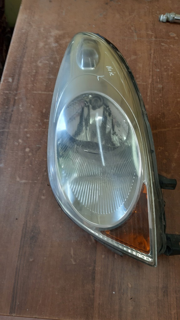 LAMPA REFLEKTOR PRZÓD NISSAN NOTE 2006 2009 PRAWA