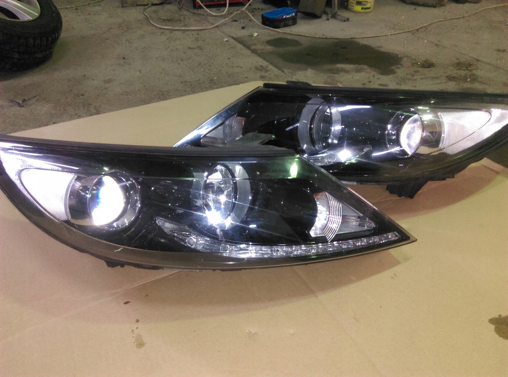 Kia Sportage III LAMPA PRZEDNIA SOCZEWKA 7769330695