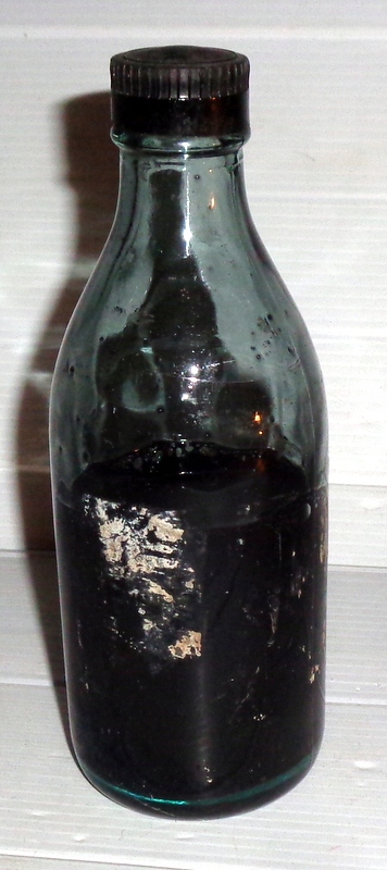 Stara flaszka z atramentem .