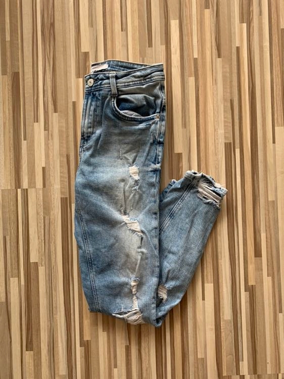 Jeansowe spodnie z przetarciami Zara Trafaluc 34