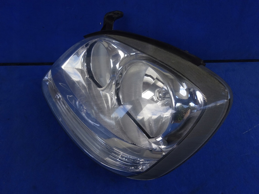 NISSAN ALMERA TINO 20032006 REFLEKTOR LAMPA LEWA