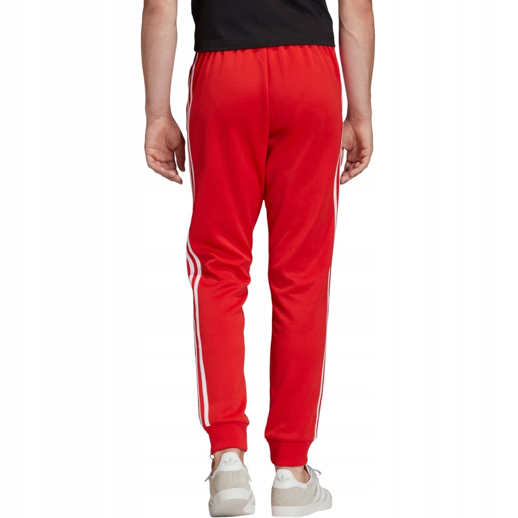 Красные штаны адидас. Штаны adidas SST. Adidas SST track Pants. Adidas Originals красные брюки. Штаны зимние adidas SST.