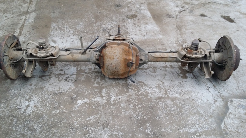 Задний мост jeep cherokee. Задний мост внедорожника американца. Трос на мосту джипа. Передний мост гранд чероки wj 2. Передний мост гранд чероки zj.