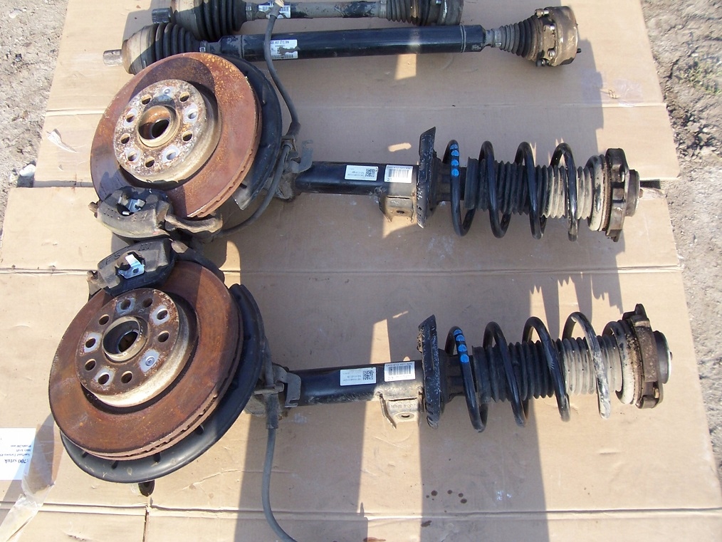 Амортизатор skoda yeti. Пружина шкода йети передняя. Стойка амортизатора шкода йети. Шкода йети передние амортизаторы. 2.