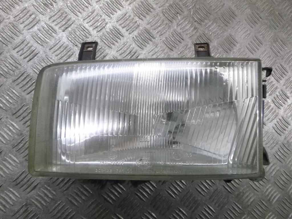 LAMPA LEWY PRZÓD VW TRANSPORTER T4 7726535118