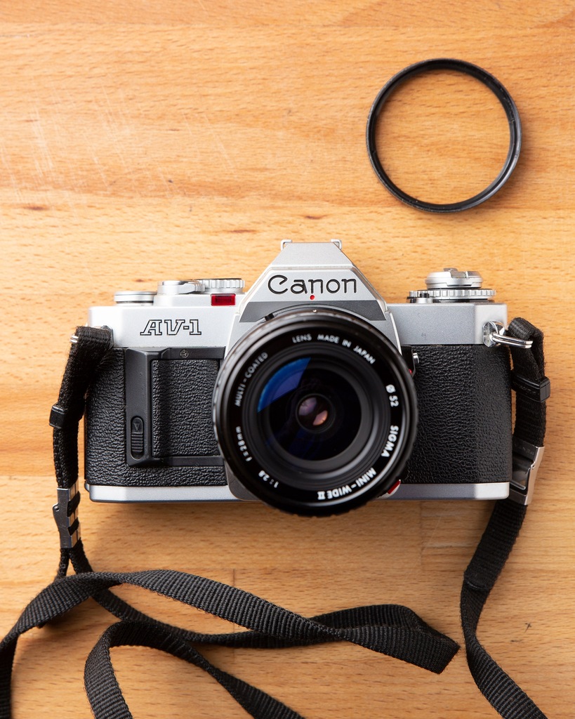 Canon AV-1 + Sigma Mini-Wide 28mm 2,8 + Pasek + UV