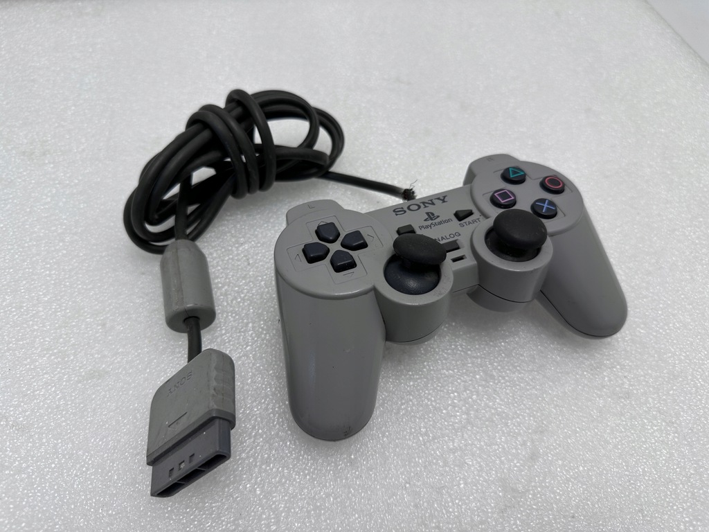 Oryginalny kontroler do konsoli Sony PlayStation1 SCPH-1200 Szary (A)
