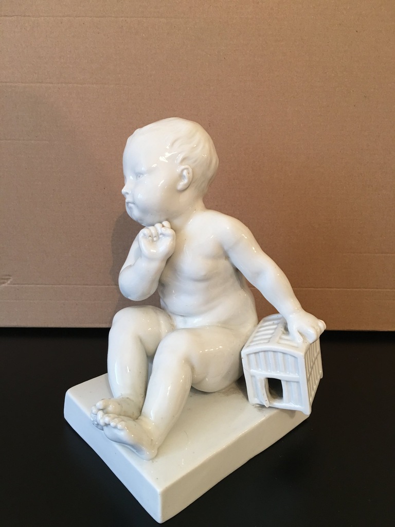 FIGURKA PORCELANOWA J. B. PIGALLE DZIECKO Z KLATKĄ
