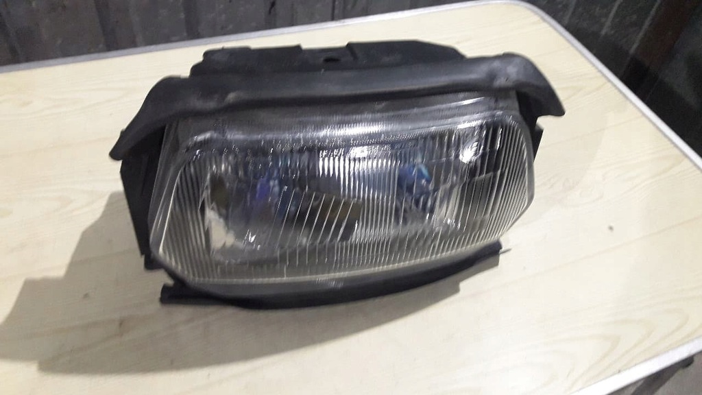 SUZUKI GSX 600 F REFLEKTOR LAMPA PRZÓD 7694930310