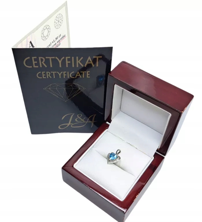 ZAWIESZKA Z BIAŁEGO ZŁOTA SERCE Z DIAMENTEM I TOPAZEM 0,80G 375