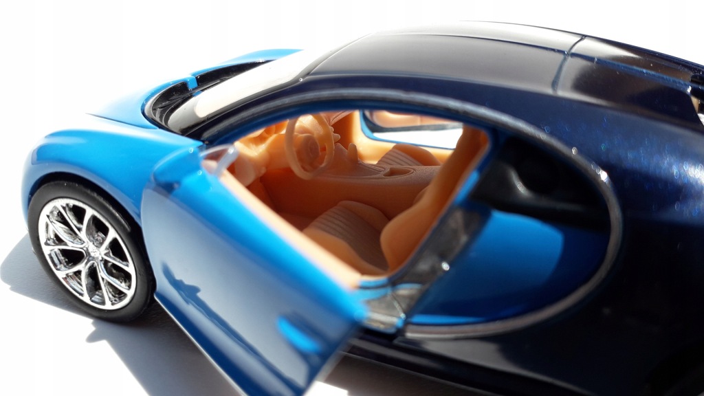 Купить Модель Bugatti Chiron из синего металла WELLY 1:34: отзывы, фото, характеристики в интерне-магазине Aredi.ru