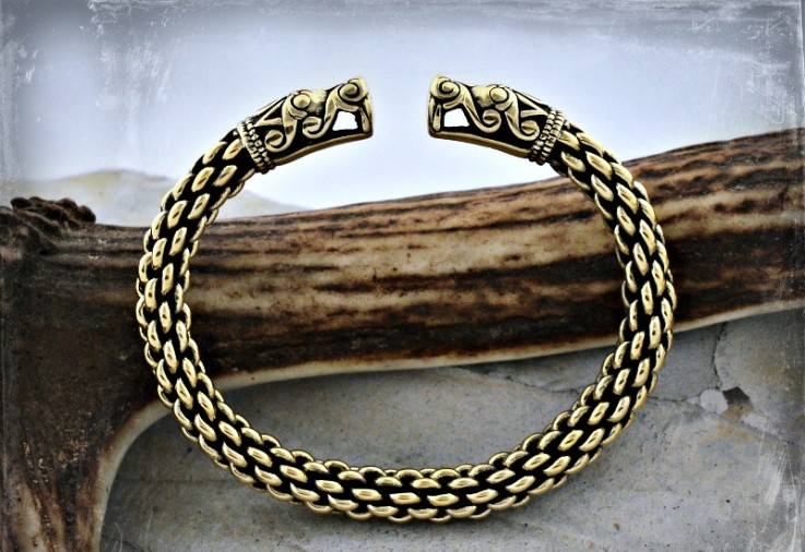 Thick Viking bracelet with large dragon head termi