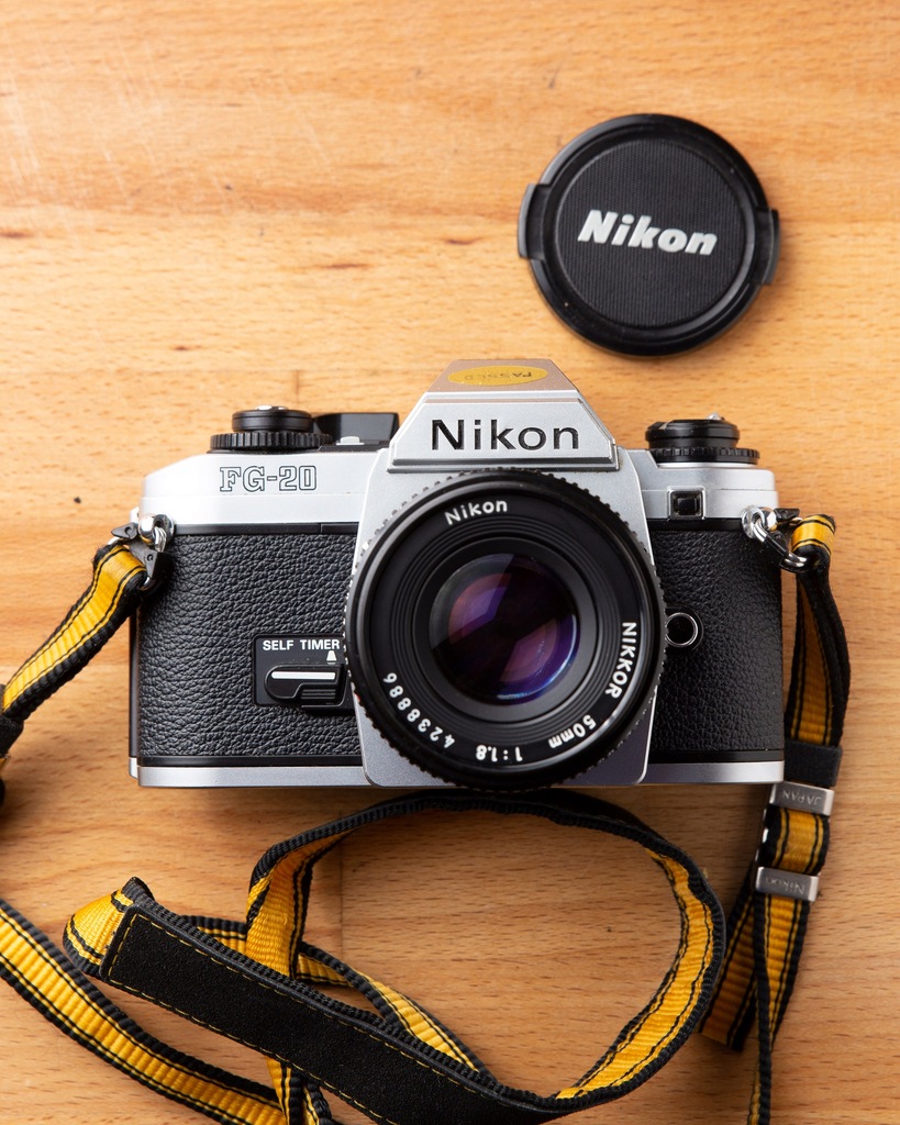 Nikon FG-20 + Nikkor 50mm f1,8 AIS +Pasek+Dekielek