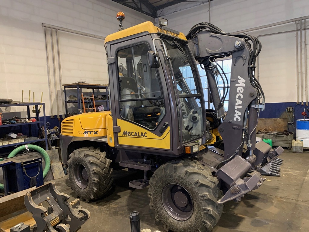 MECALAC 12MTX 2009 rok 145000 + VAT