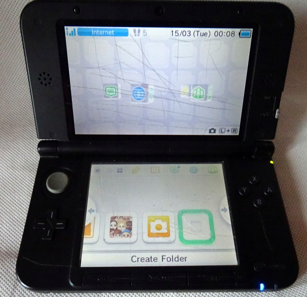 konsola Nintendo 3DS XL spr-001 sama konsola dziala mimo tragicznego stanu