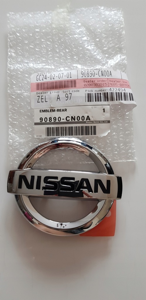 Emblemat Nissan Juke tył 90890-CN00A 2010-> ory